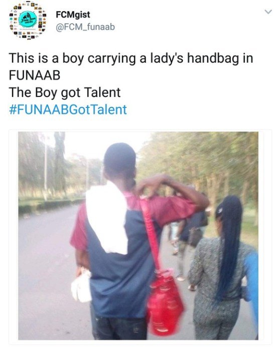 A Guy Carrying A Lady’s Handbag In FUNAAB (See Photo)