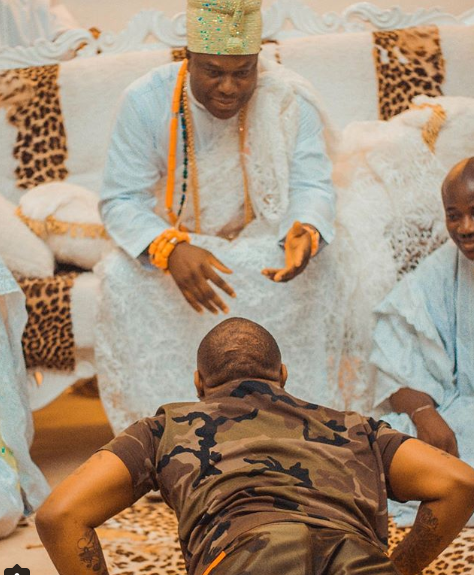 Davido Prostrates On The Ground As He Pays Visit To Ooni Of Ife (Photos)