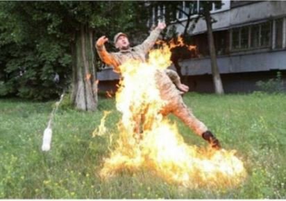 SAD: Soldier Sets Himself On Fire After Being Sacked From Army (Graphic Photos)