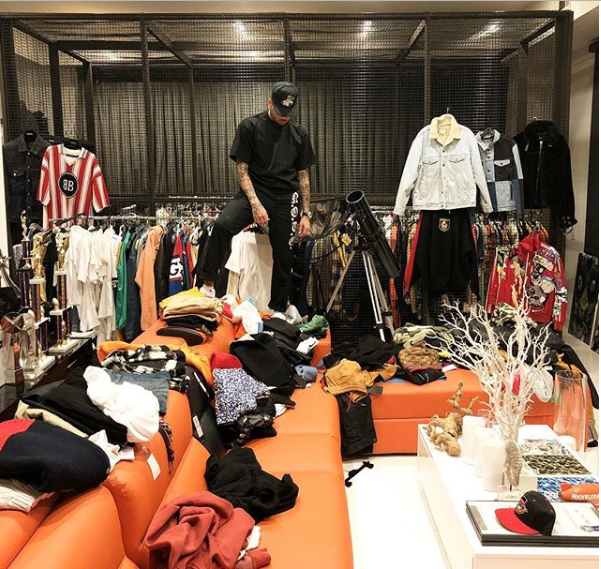 Chris Brown shows off his walk-in closet as he complains he’s out of space for his clothes (Photo)