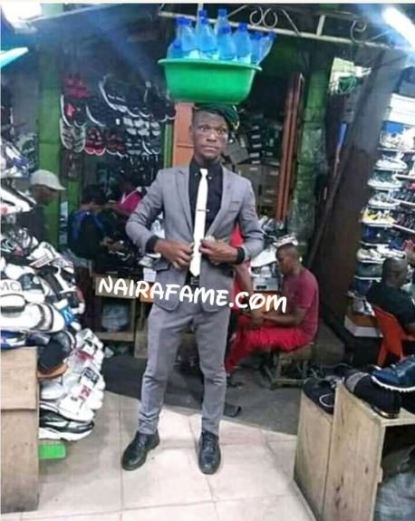 Man Hawking Bottle Water In Suit Spotted In Lagos Market (Photos)