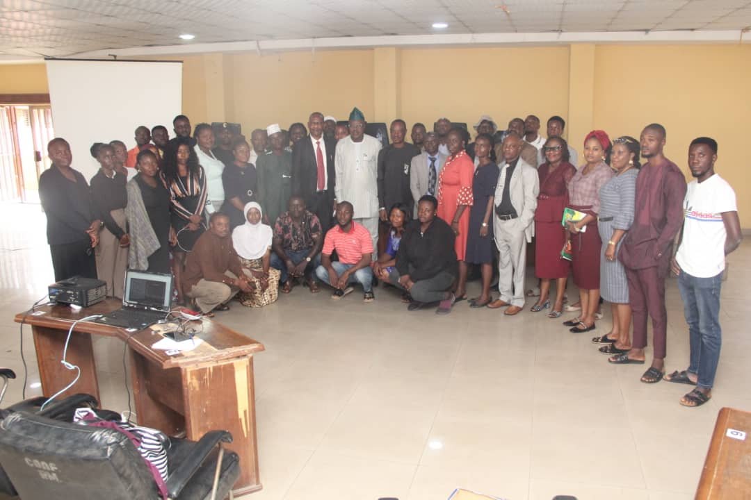 Dr. Nureni Adeniran in a group photograph with NBS Enumerators