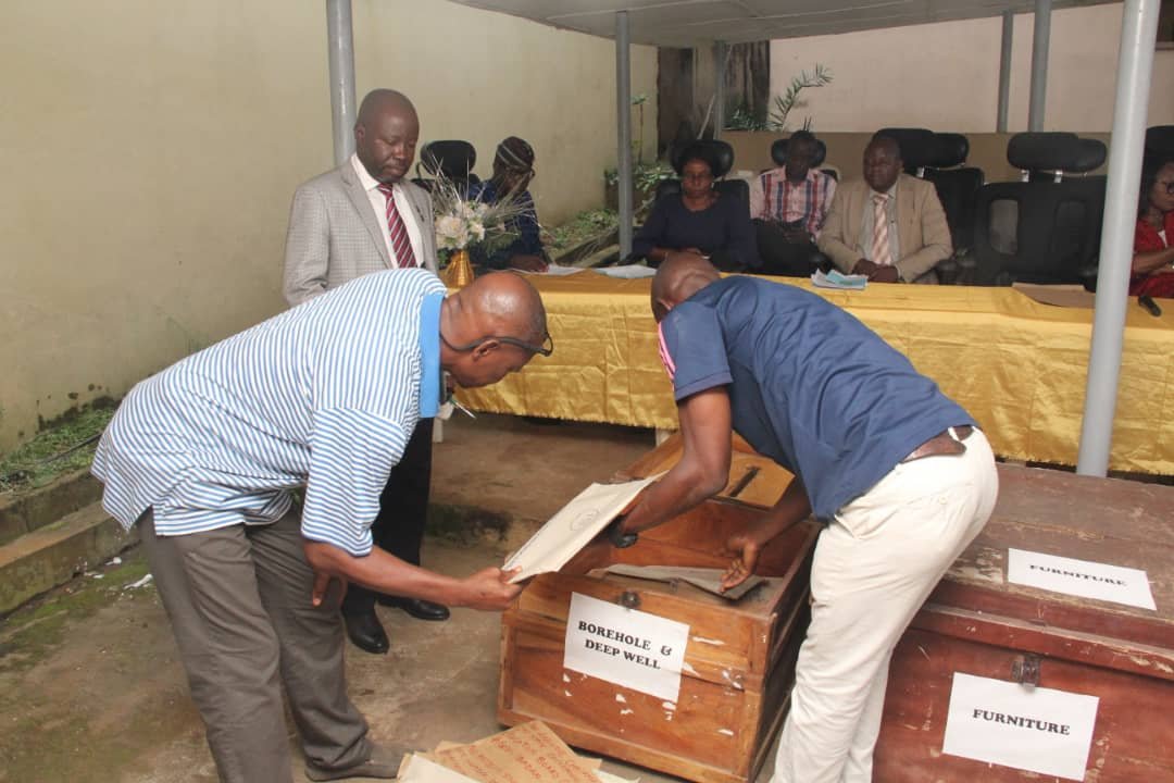 Staff members of the Board sorting the lots during the bid opening exercise